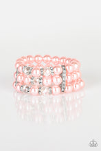 Load image into Gallery viewer, Paparazzi - Undeniably Dapper - Pink Bracelet - Pinched between white rhinestone encrusted frames, white rhinestone encrusted rings, crystal-beads, and pink pearls are threaded along elastic stretchy bands for a glamorous look.  Paparazzi Jewelry and accessories are lead-free and nickel-free.  Sold as one individual bracelet.