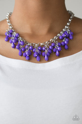 Modern Macarena Purple Necklace - Featuring round and teardrop shapes, clusters of faceted purple beads swing from the bottom of a shimmery silver chain, creating a playful fringe below the collar. 