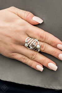 Pearl, Silver and Rhinestone Ring -  Sleek, classy, metallic designs that you’d find on the streets of New York.