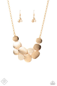 Papararazzi - A Hard LUXE Story - Gold Necklace - Paparazzi Accessories Etched linear textures or white rhinestones adorn each disc, offering a gorgeous collision of texture, gold, sheen, and sparkle. Features an adjustable clasp closure.