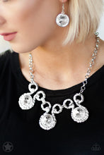 Load image into Gallery viewer, Three over-sized  white rhinestones on a silver Necklace- Paparazzi Accessories  Three dramatically over-sized rhinestones are nestled into textured silver fittings that are connected by oval silver frames, creating a brilliant statement piece.  Features an adjustable clasp closure.