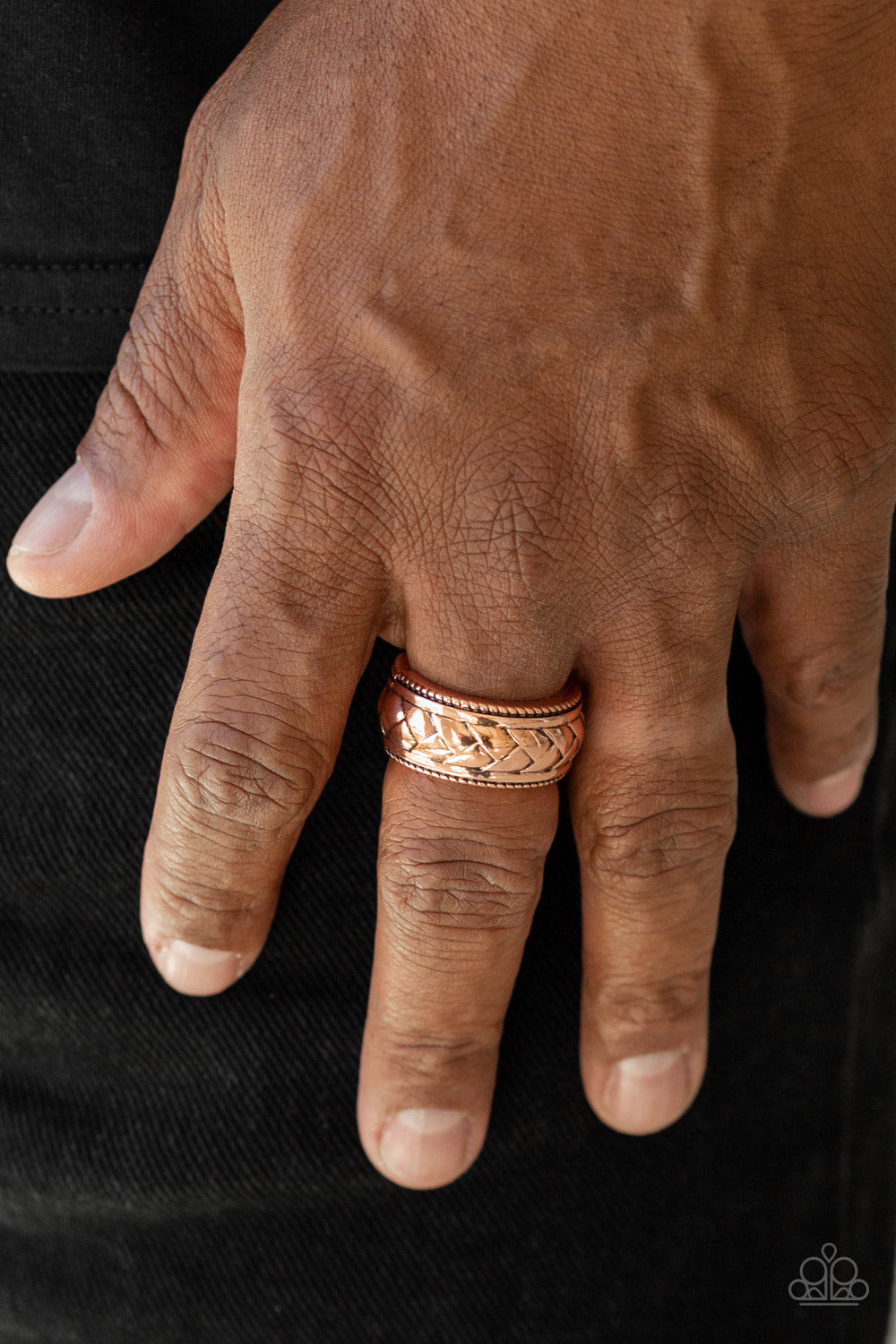 Field Artillery Copper Men's Ring - Brushed in an antiqued finish, a chevron-like pattern is embossed across the center of a textured copper band for a casual look. Features a stretchy band for a flexible fit.